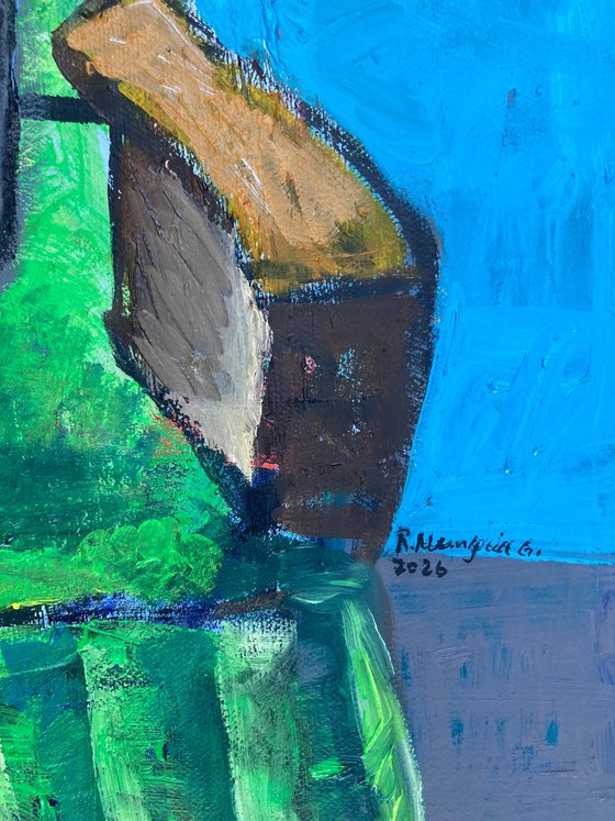 Cat in a green sofa