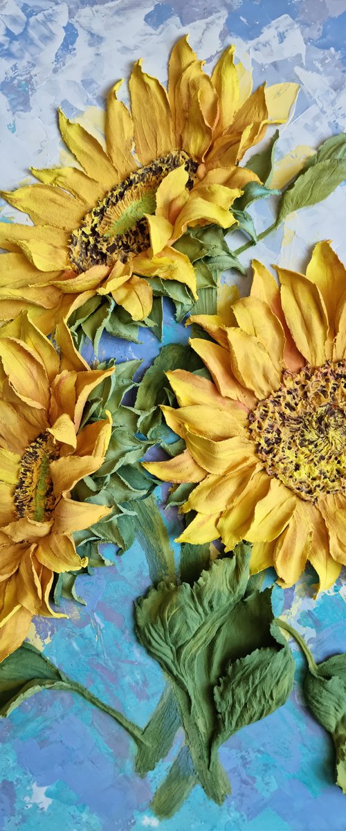 Sunflowers. Fragments of the summer sun. / floral still life relief with bright yellow flowers on a blue background by Irina Stepanova