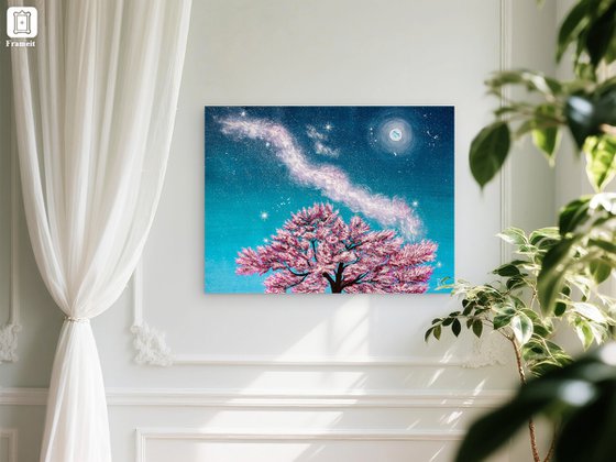 Pink sakura blossoms at night