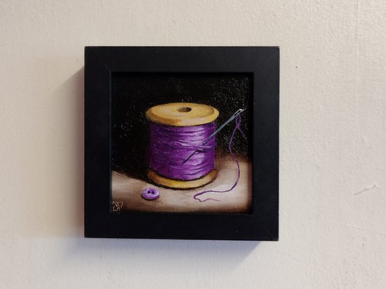 Little Purple  cotton reel  still life