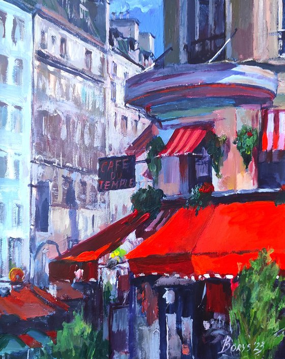 French cafe with a red roof in summer