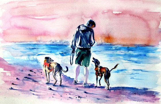Walk with dogs on the beach