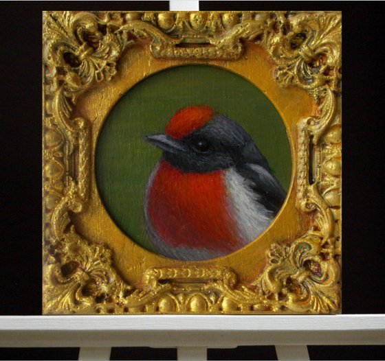 Small bird painting in frame