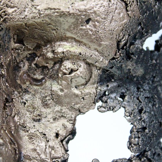 A tear 58-21 - Face sculpture bronze steel