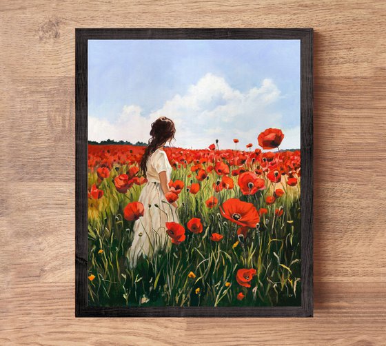 Woman in a red poppy field