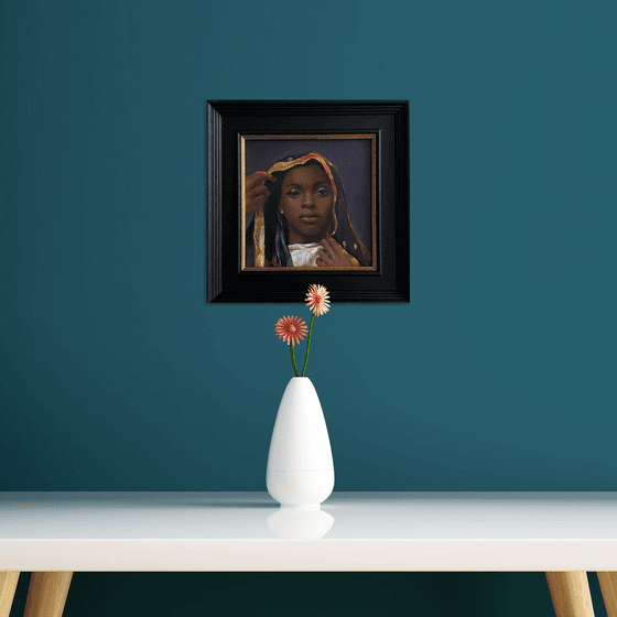 Young Black Woman oil portrait with frame.