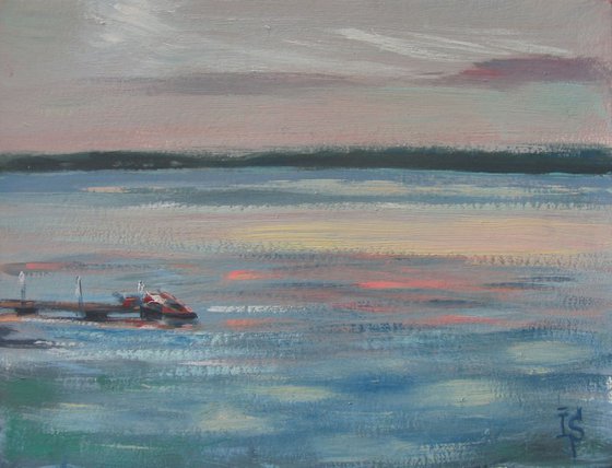 Sunset at Volgo lake. The Jet ski.