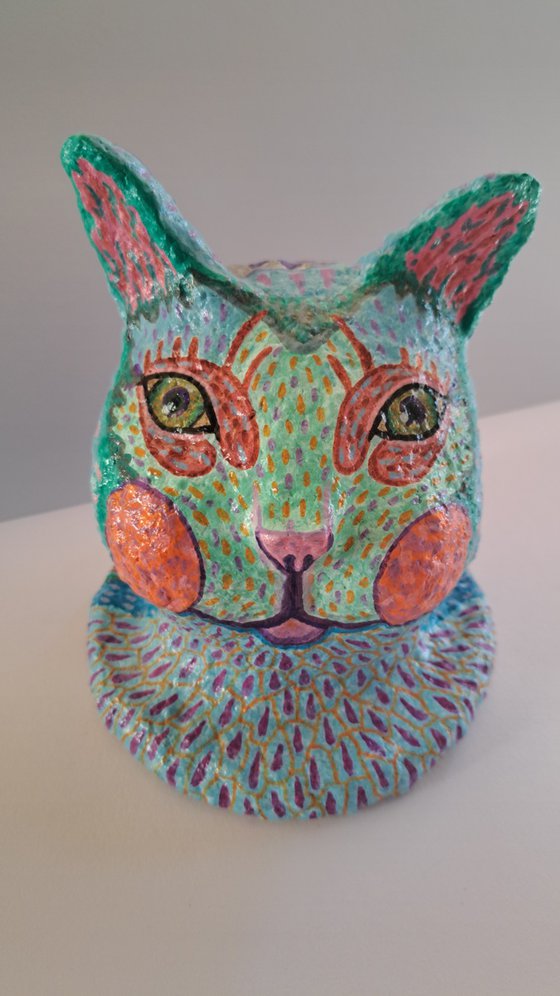 Silly cat, what are they feeding you?