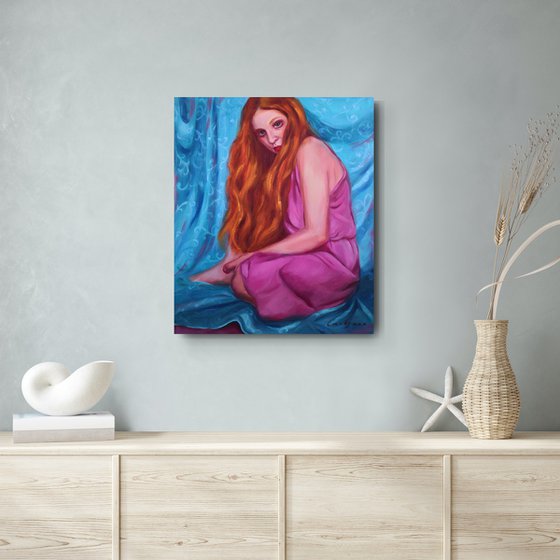 Red-haired girl on turquoise background