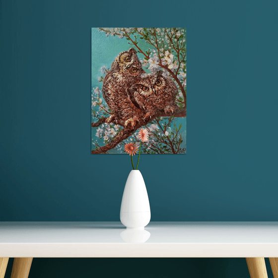 Spring landscape with owls