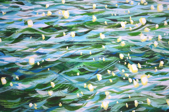 Glare in emerald water.