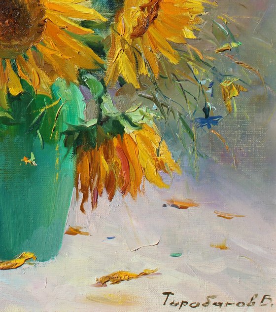 Sunflowers in a green vase