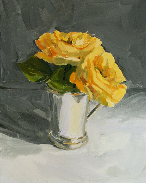 Yellow roses in silver cup