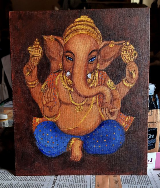 Lord Ganesh with blue eyes