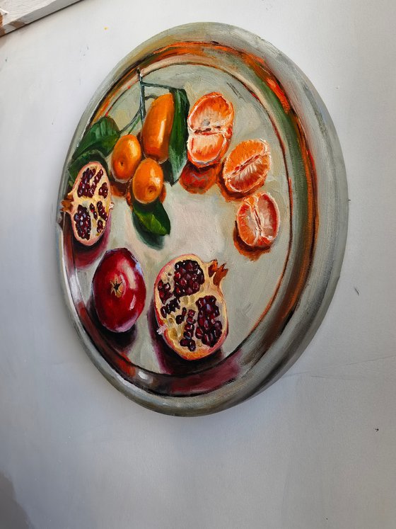 Pomegranates and tangerines