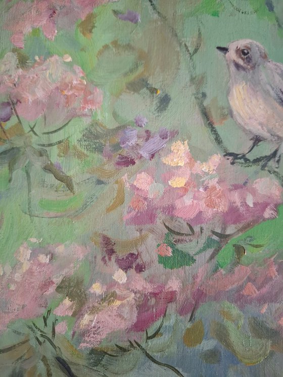 A Bird in a Blooming tree