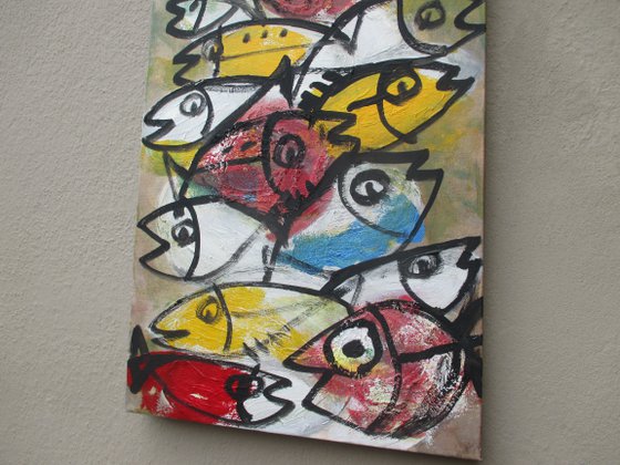 coloured fishes jumping