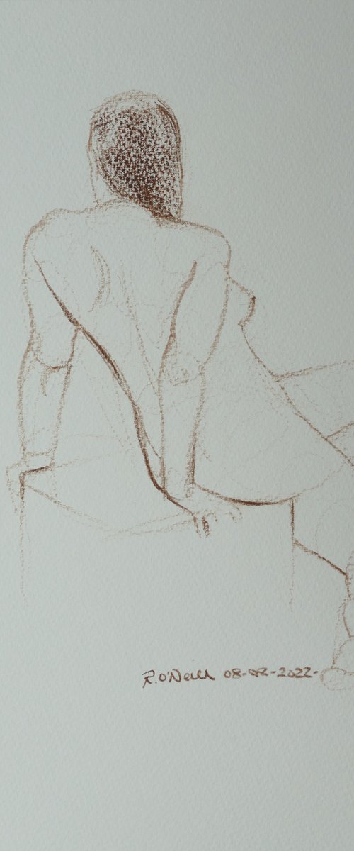 Seated female nude by Rory O’Neill