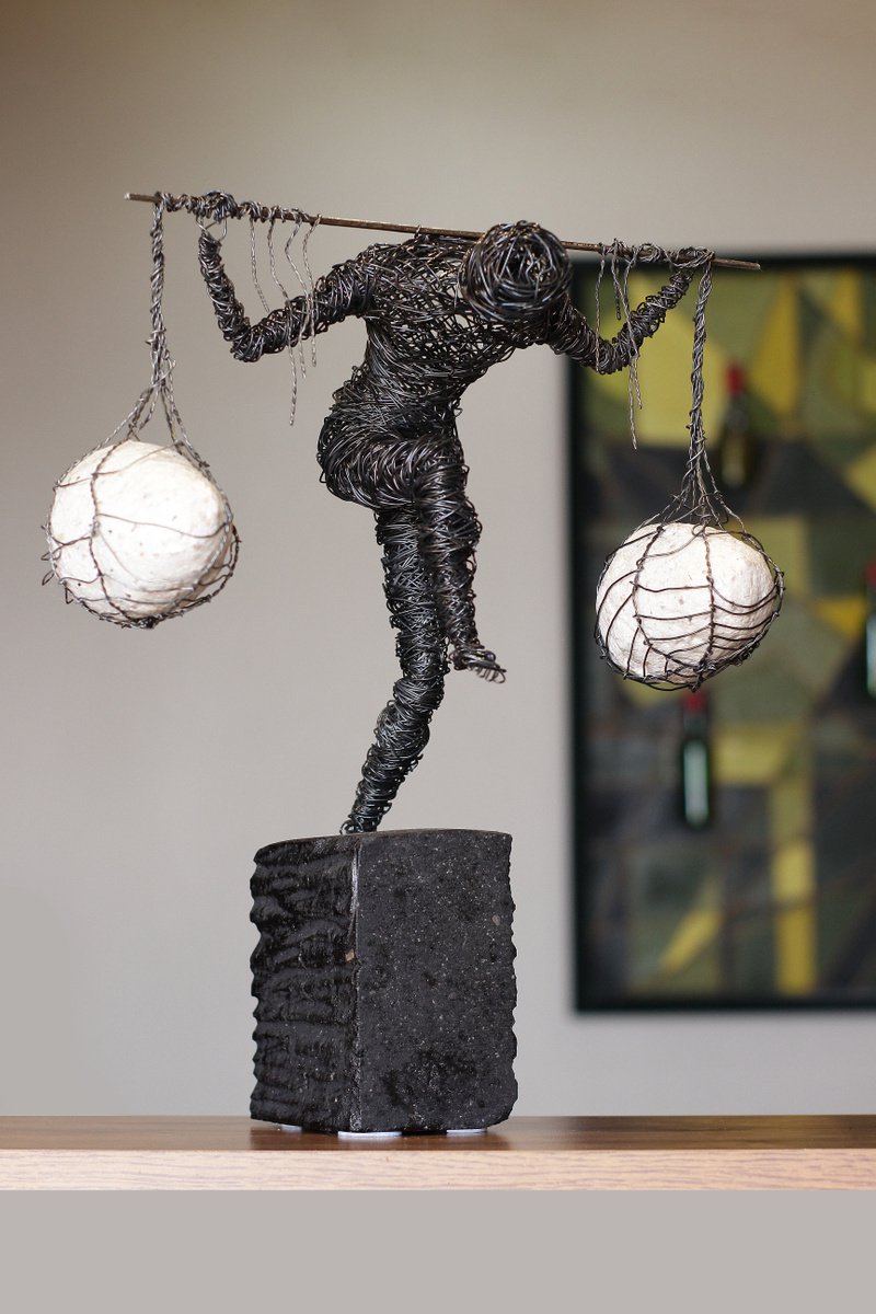 Carrying life (41x33x21 3.4kg iron, perlite, tufa) by Karen Axikyan