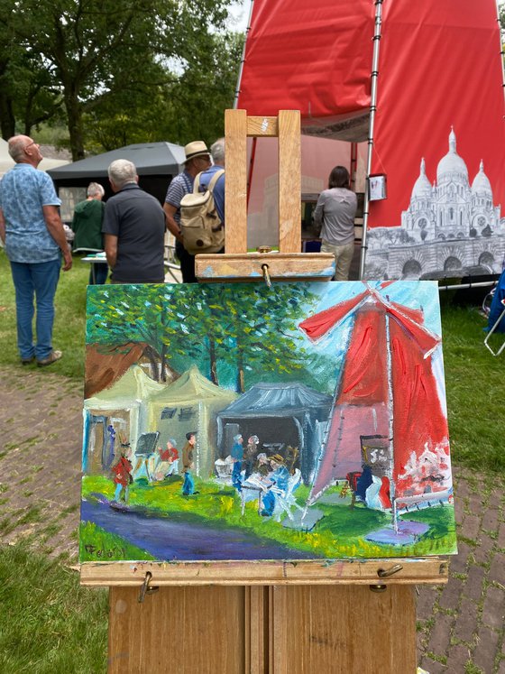 Red windmill at art festival