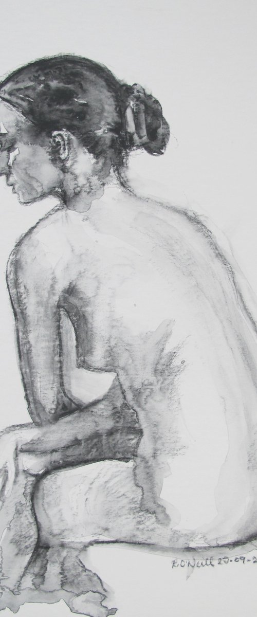 Seated female nude by Rory O’Neill