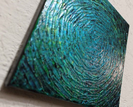 Small iridescent green blue shine