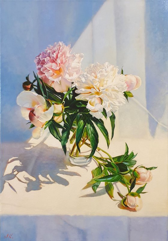 "Peonies bathe in sunlight."