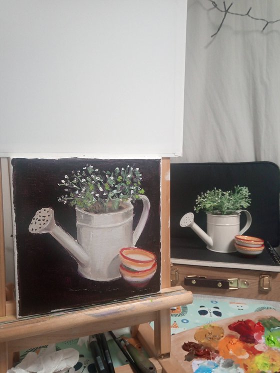 Still life with a watering can and small bowls