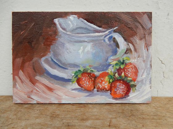 Cup with strawberries.