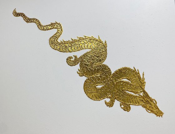 Golden dragon on white