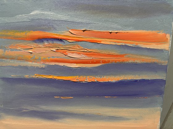 Sunset over the field. Plein air