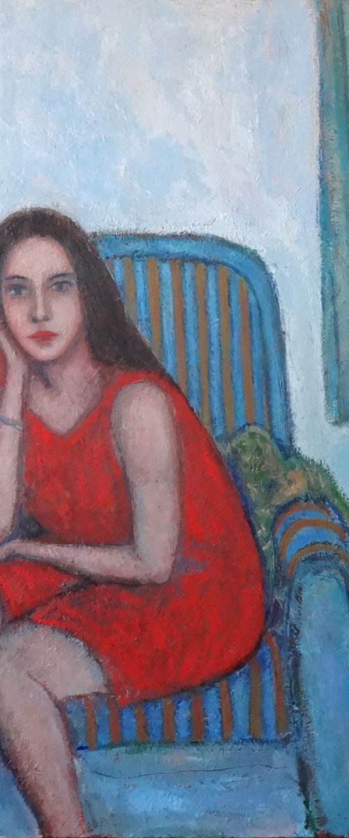 Woman on armchair with a storm outside by Massimiliano Ligabue
