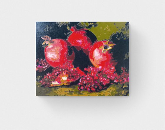 Pomegranates in dark