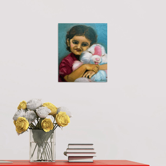 Little girl with a teddy