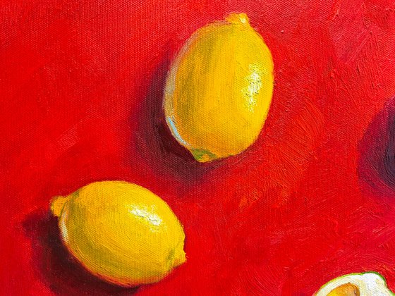Lemon on red background