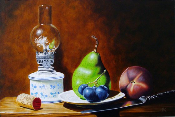 Oil lamp with fruits