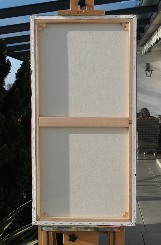 Portrait in a red chair.