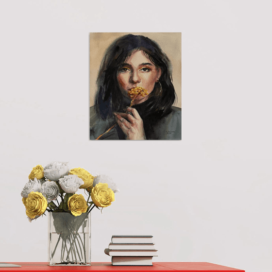 Portrait of a girl with a flower