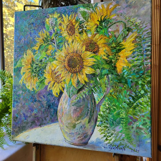 Sunflowers on the windowsill.