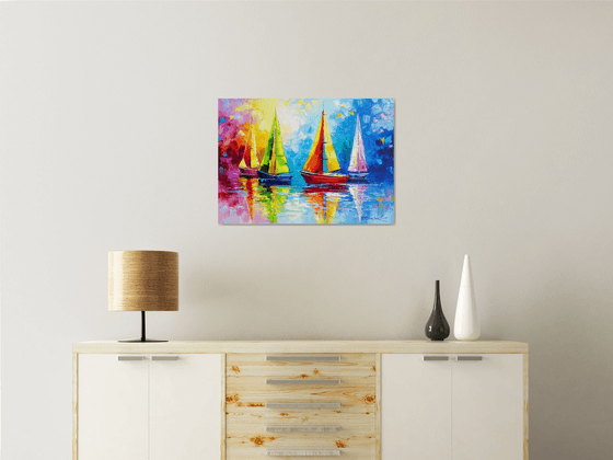 Sailboats in the rainbow dawn