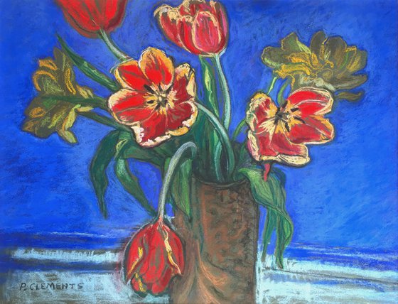 Red Tulips on a blue background