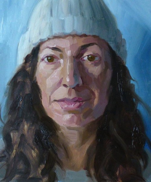 Female Portrait in a Woolly Hat by Nick Richards