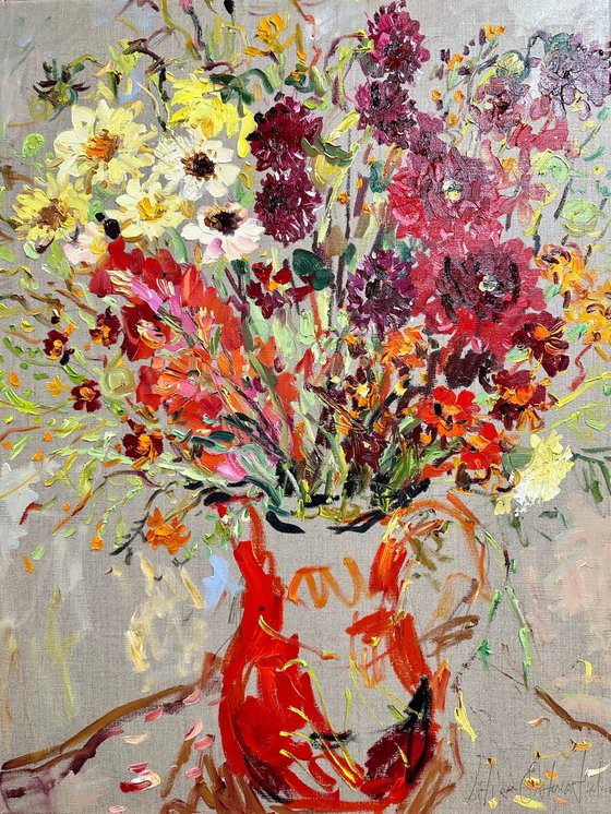 Summer flowers in a red jug