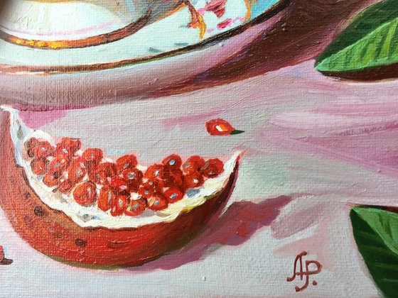 Cup and pomegranate