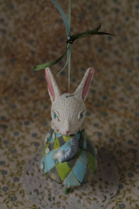 Little rabbit in harlequin dress. Hanging sculpture, bell doll by Elya Yalonetski