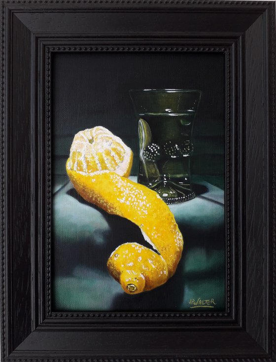 Peeled lemon with Römer glass