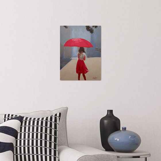 Girl with a red umbrella
