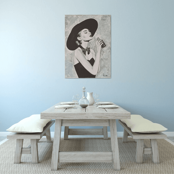 Woman with a bottle of perfume