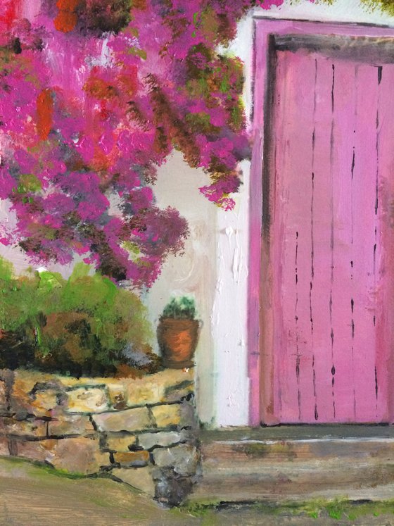 Mediterranean House with Pink Flowers