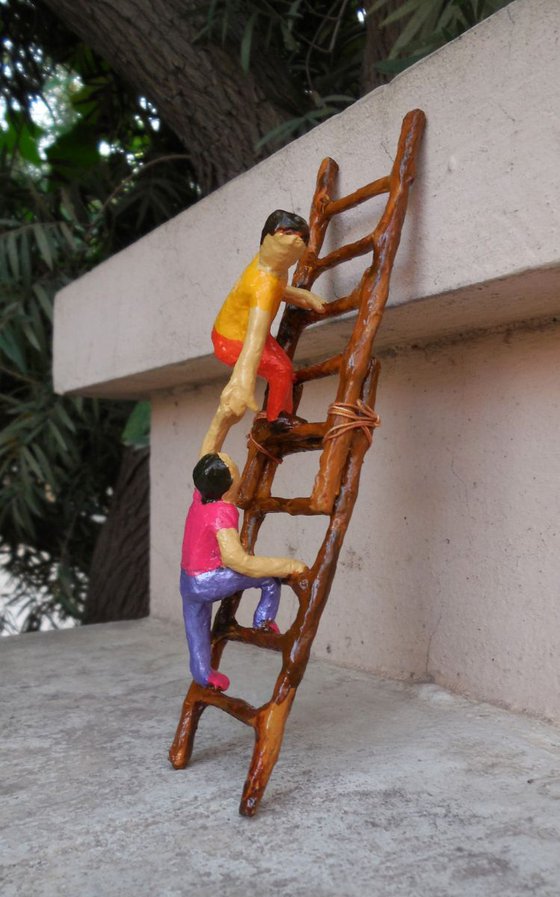Kids Climbing Ladder